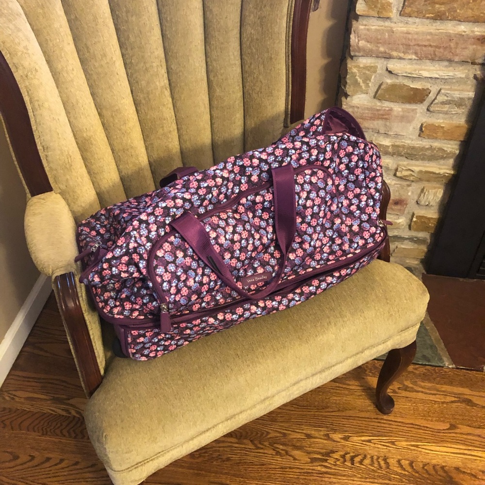 Vera Bradley rolling duffel.  22x11x12